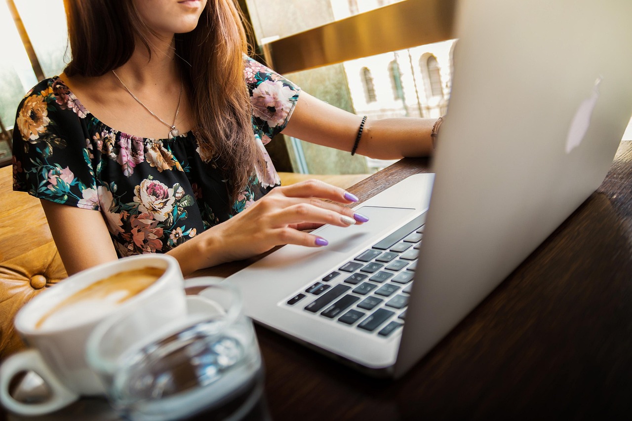 A digital marketing professional analyzing media buying strategies on a computer screen